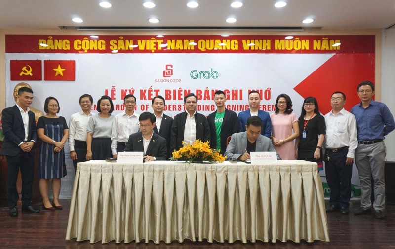 Saigon Co.op kí hợp tác với Grab để phát triển thanh toán điện tử và logistics - Ảnh: Saigon Co.op